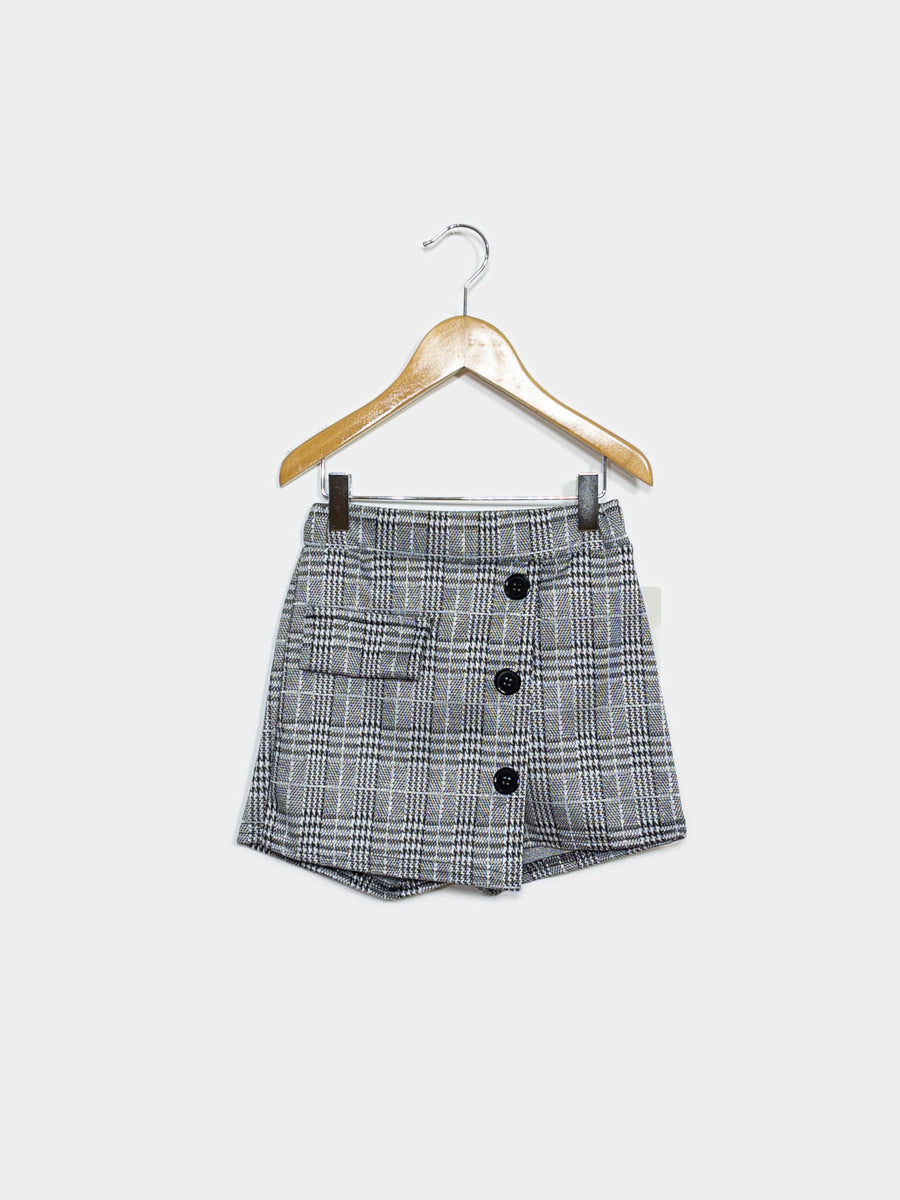 Jupe short en daim avec bouton